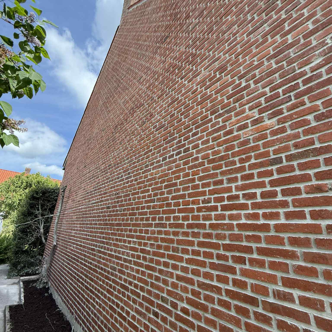 Omfuget murstensfacade udført af Vork & Sørensen